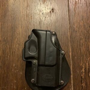 Fobus right handed paddle retention holster.  Model #GL2